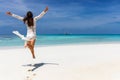 Happy traveler girl in white summer dress in the Maldives Royalty Free Stock Photo