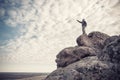 Traveler on a Mountain Top