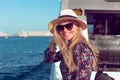 Happy traveler woman toothy smile on cruise ship on Mediterranean sea Royalty Free Stock Photo