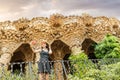 Traveler woman tourist enjoying great view and taking selfie in famous Guell park in Barcelona