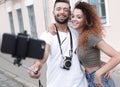 Happy traveling couple making selfie, romantic mood.