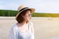 Happy traveller asian woman standing at the beach,Enjoying and relaxing time