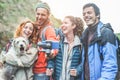 Happy trekkers people making video vlog with gimbal phone - Young hiker friends having fun on mountain excursion day - Technology Royalty Free Stock Photo