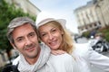 Happy trendy couple shopping in town Royalty Free Stock Photo