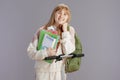 happy trendy school girl in beige tracksuit with backpack Royalty Free Stock Photo