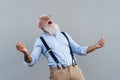 Happy trendy senior man having fun dancing in front camera Royalty Free Stock Photo