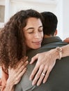 Happy, trust and a couple hugging in their home for support, care or romance in marriage together. Peace, love and Royalty Free Stock Photo