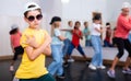 Happy tweens practicing hip hop in dance studio Royalty Free Stock Photo
