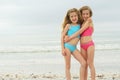 Happy twins at the beach Royalty Free Stock Photo