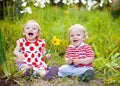 Happy twins outdoor Royalty Free Stock Photo