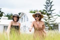 Happy two asian woman standing in green garden at nature together,Outdoor portrait Royalty Free Stock Photo