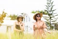 Happy two asian woman standing in green garden at nature together,Outdoor portrait Royalty Free Stock Photo