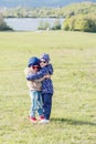 Happy two little girls on the grass Royalty Free Stock Photo