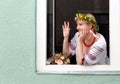 Happy Ukrainian woman in the window