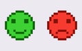 Happy and unhappy 8 bit emoticon. Joyful green character with smiling face and sad red with angry depression. Royalty Free Stock Photo