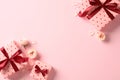 Happy Valentine day banner with gits boxes and roses on pink background.