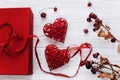 Happy valentine day concept. stylish present and two red hearts Royalty Free Stock Photo