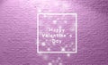 Happy valentine day lettering in front of aged purple brick wall. beautiful purple pink tone and white font