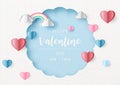 Happy Valentine day\'s wording in white abstract circle with colorful harts and rainbow clouds hang on blue paper pattern