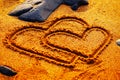 Happy Valentine day - hearts draw on the beach