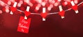 Happy Valentine`s Day background banner panorama - Red paper note hang on wooden clothes pegs with wooden heart and bokeh lights