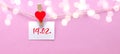 Happy Valentine`s Day background banner - White paper note hang on wooden clothes pegs with wooden hearts on a string isolated on Royalty Free Stock Photo