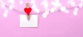 Happy Valentine`s Day background banner - White paper note hang on wooden clothes pegs with wooden hearts on a string isolated on Royalty Free Stock Photo