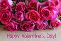 Happy Valentine`s Day.Bouquet of pink roses on wooden background.St Valentine`s Day concept with copy space.