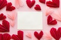 Happy Valentine`s day! Empty card and stylish red and pink hearts flat lay on pink paper background. Creative modern valentines Royalty Free Stock Photo