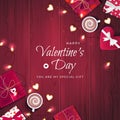 Happy Valentine`s Day greeting background. Top view on gift boxes in different packaging, confetti, garlands cookies Royalty Free Stock Photo