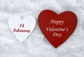 Happy Valentine`s Day greeting card.Holiday Valentine decoration.Two wooden hearts on natural white snow background. Royalty Free Stock Photo