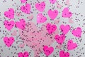 `Happy Valentine`s Day` message on a big pink hart with a lot of pink harts and sparkles around it
