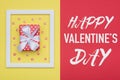 Happy Valentine`s Day Pastel Candy Colours Background. Valentines day flat lay minimal concept with beautifully wrapped present