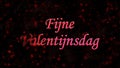 Happy Valentine's Day text in Dutch Fijne Valentijnsdag turns to dust from left on dark background Royalty Free Stock Photo