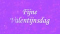 Happy Valentine's Day text in Dutch Fijne Valentijnsdag turns to dust from left on purple background Royalty Free Stock Photo