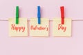 Happy Valentine`s Day text on hanging paper note