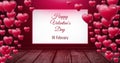 Happy Valentine`s Day 14th February text and Shiny bubbly Valentines hearts in room with wooden floo