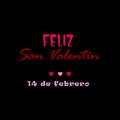 Happy Valentine\'s Day written in spanish in red and pink with hearts on black background
