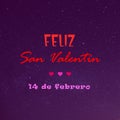 Happy Valentine\'s Day written in spanish in red and pink with hearts on starry purple background