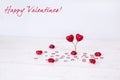 Happy Valentine`s text with heartson a white background