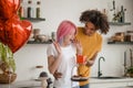 Young couple celebrating valentines day and feeling happy