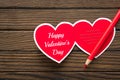 Happy Valentineday words on wooden background Royalty Free Stock Photo