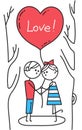 Happy Valentines Card. Guy and girl kiss in park. Lovers holding red heart shaped balloon with inscription Love Royalty Free Stock Photo