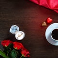 Happy Valentines Day background with wedding ring, rose flowers, cup of coffee and chocolate candy Royalty Free Stock Photo