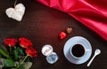 Happy Valentines Day background with wedding ring, rose flowers, cup of coffee and chocolate candy Royalty Free Stock Photo