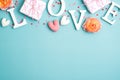 Happy Valentines Day banner design. Frame border made of LOVE word letters , gift boxes, knitted hearts. Flat lay, top view Royalty Free Stock Photo