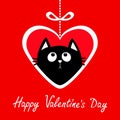 Happy Valentines Day. Big paper heart hangin on dash line with bow. Black cat kitten looking up. Cute cartoon funny animal charact Royalty Free Stock Photo