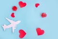 Toy airplane on blue table with red heart Royalty Free Stock Photo