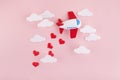 Happy Valentines day. Children`s plane on a pink background with red heart and white clouds Royalty Free Stock Photo