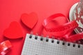 empty notebook next to red hearts Royalty Free Stock Photo